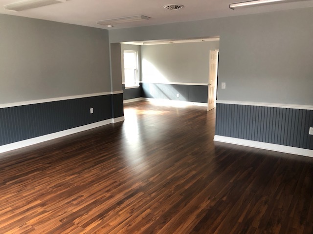 a hallway with wood floors