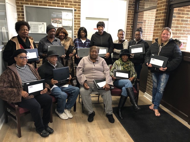 Group of graduates who received computers.