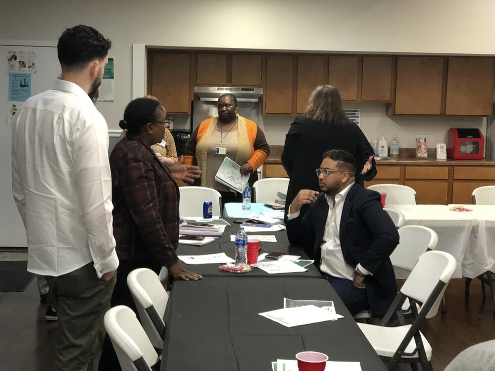 PCC attendees networking after the quarterly meeting.