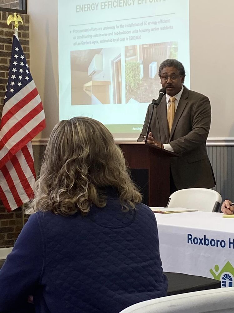A man speaking at a podium.