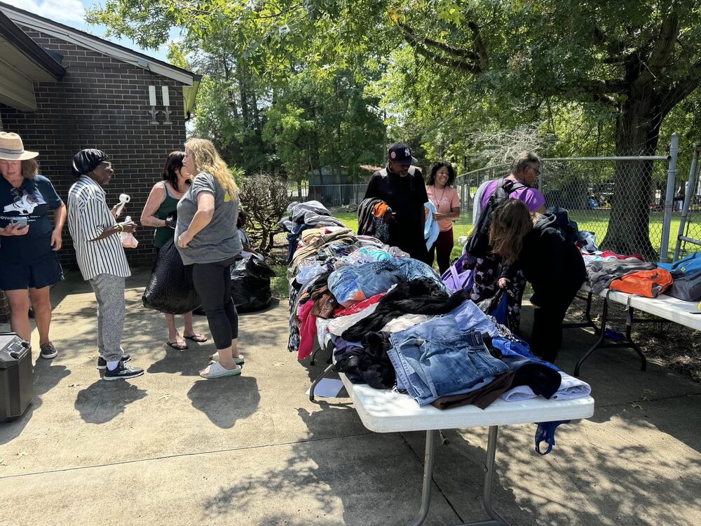 Residents looking through donated clothing. 
