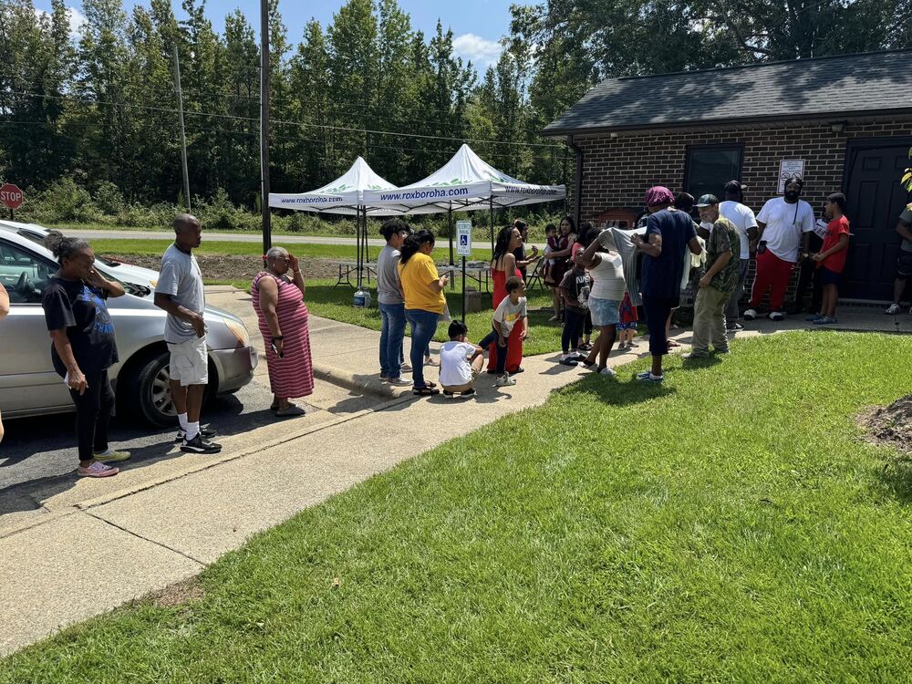 Residents lined up for the bookbag event.