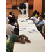 Roxboro Boys Initiative members around a table.