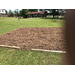 The mulch spread out on the sectioned off area.