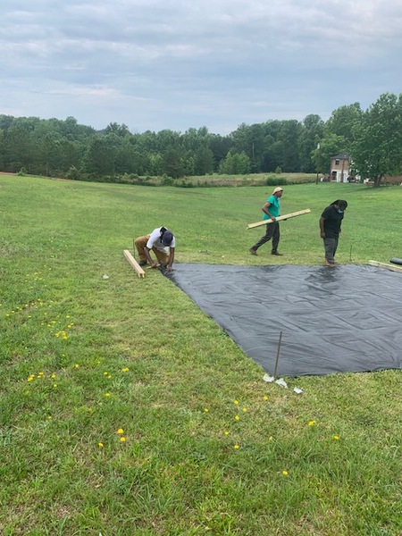 GettingStartedwithFoundation.jpeg Staking out a section of ground.